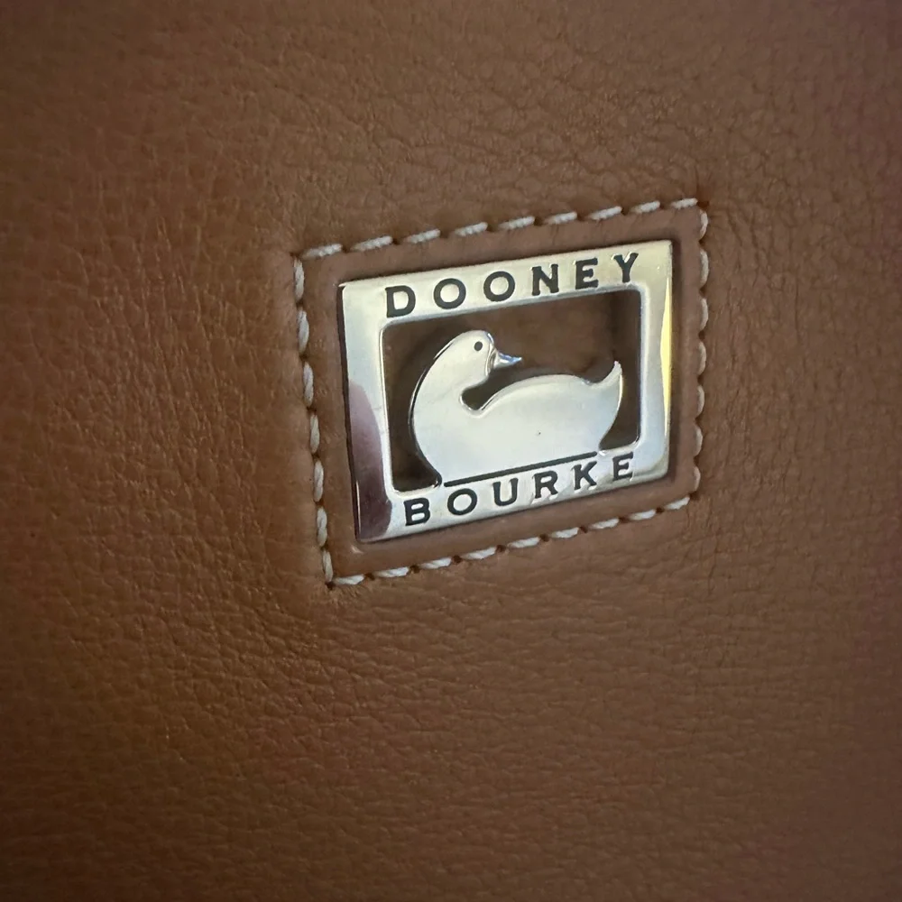 Dooney & Bourke Pebbled Grain Pocket Sac Crossbody with Side Pockets.